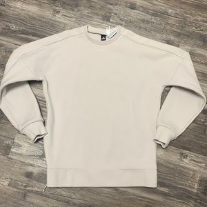 Adidas Sweatshirt side zipper. Size small. Cream colored.